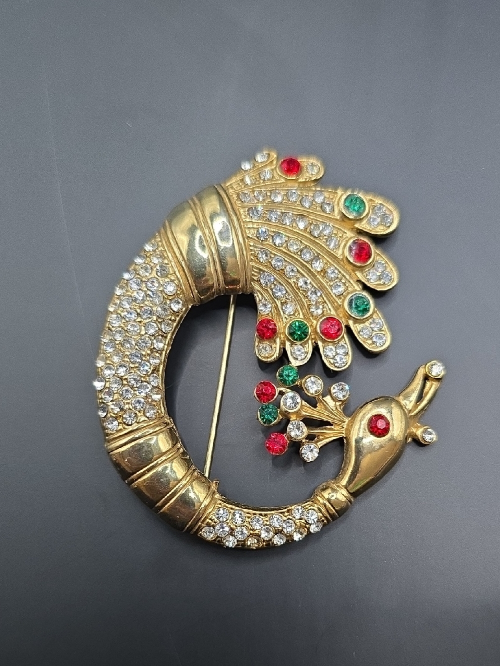Gold-Tone Peacock Rhinestone Brooch with Red & Green Crystals
